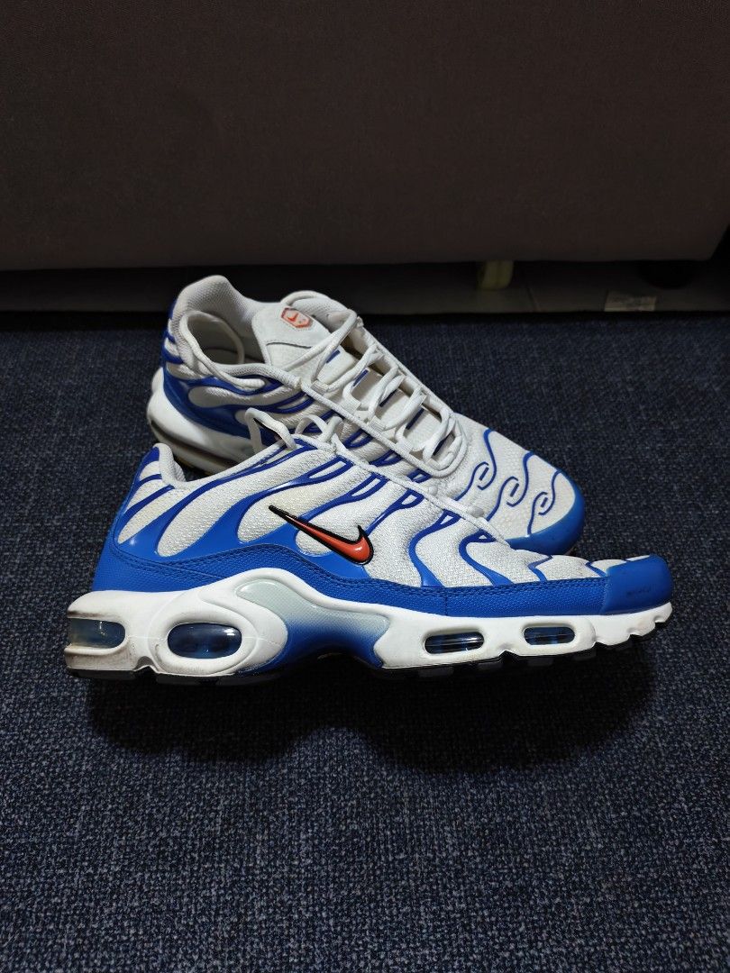 Nike Air Max Plus TN White Blue (Category: Sneakers) located in Manila. Submitted by kdsgadgethub (Listing ID 1470322741, Image 1). Description: - Model: Nike Air Max Plus (Tn) - Colorway: White and Blue with classic orange swoosh outline - Key Features: Iconic wavy cage overlay, signature Tn Air branding on heel and tongue - Cushioning: Visible Max Air units in the midsole for all-day comfort - Sole: Clean white rubber outsole with crisp white l