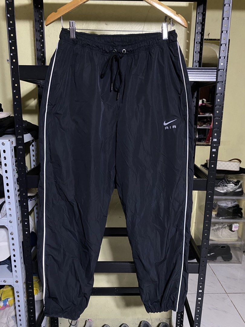 Nike Air Woven Pants (Reflective) (Category: Joggers) located in San Jose. Submitted by shady.archives (Listing ID 1470345799, Image 3). Description: Nike Air Woven Pants Reflective Med on tag Measurements: 30-34 waist 39 length Very good condition Price: ₱1,500 only.