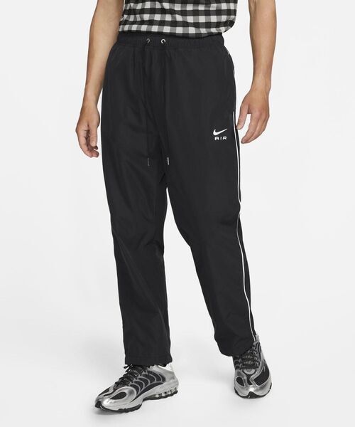 Nike Air Woven Pants (Reflective) (Category: Joggers) located in San Jose. Submitted by shady.archives (Listing ID 1470345799, Image 1). Description: Nike Air Woven Pants Reflective Med on tag Measurements: 30-34 waist 39 length Very good condition Price: ₱1,500 only.