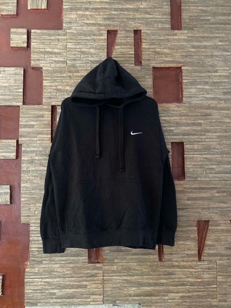Nike Black Hoodie with Drawstrings and Front Pocket (Category: Hoodies) located in Alegria. Submitted by happypenguin-d20d (Listing ID 1470213310, Image 1). Description: - Authentic black Nike hoodie - Small white embroidered swoosh logo on chest - Front kangaroo pocket for storage - Adjustable drawstrings on hood - Ribbed cuffs and hem for a snug fit - Standard fit, great for casual days or workouts.