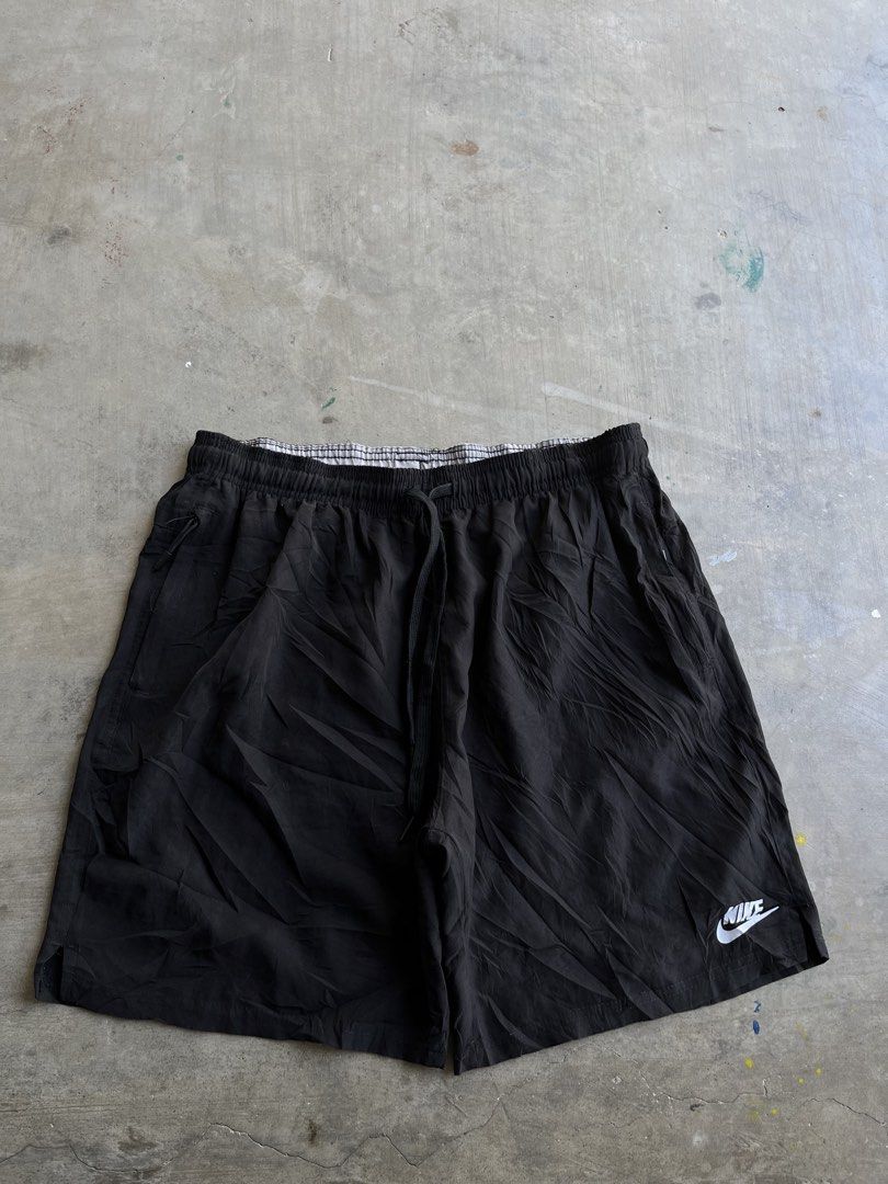 Nike Black Sports Shorts with Drawstring (Category: Shorts) located in Dipaculao. Submitted by _jzx.ph4lxfe (Listing ID 1470214925, Image 1). Description: - Brand: Nike - Color: Black with white printed logo - Size/Fit: Standard fit, lightweight fabric - Waist: Elastic with adjustable drawstring - Condition: Excellent, clean with no flaws - Ideal for: Gym workouts, running, or casual lounging.