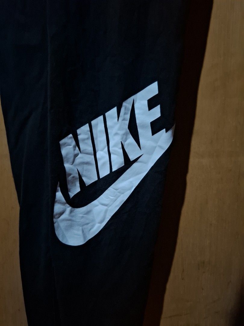 Nike Black Sweatpants Size XS (Category: Other Bottoms) located in Victorias. Submitted by doc_keith (Listing ID 1470298539, Image 2). Description: Brand: Nike Color: Black Size: XS (11x31.5) strechable - Material: Comfortable cotton and polyester blend - Design: Big white Nike logo printed down the leg - Features: Elastic waistband with inner branding Origin: Made in Sri Lanka Condition: Great for working out or casual daily wear 400 shipped Neg