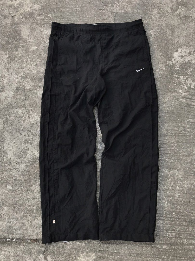 Nike Black Track Pants Size M (Category: Joggers) located in Imus. Submitted by yoboi.04 (Listing ID 1470225895, Image 1). Description: - Brand: Nike - Item: Track Pants - Color: Black - Size: Medium - Fit: Standard relaxed fit - Material: 100% polyester with breathable mesh lining - Features: Elastic waistband and trendy side panel details - Condition: Clean fabric inside and out, well-maintained - Style Code: 259887-010 - Trusted seller: Buy wi