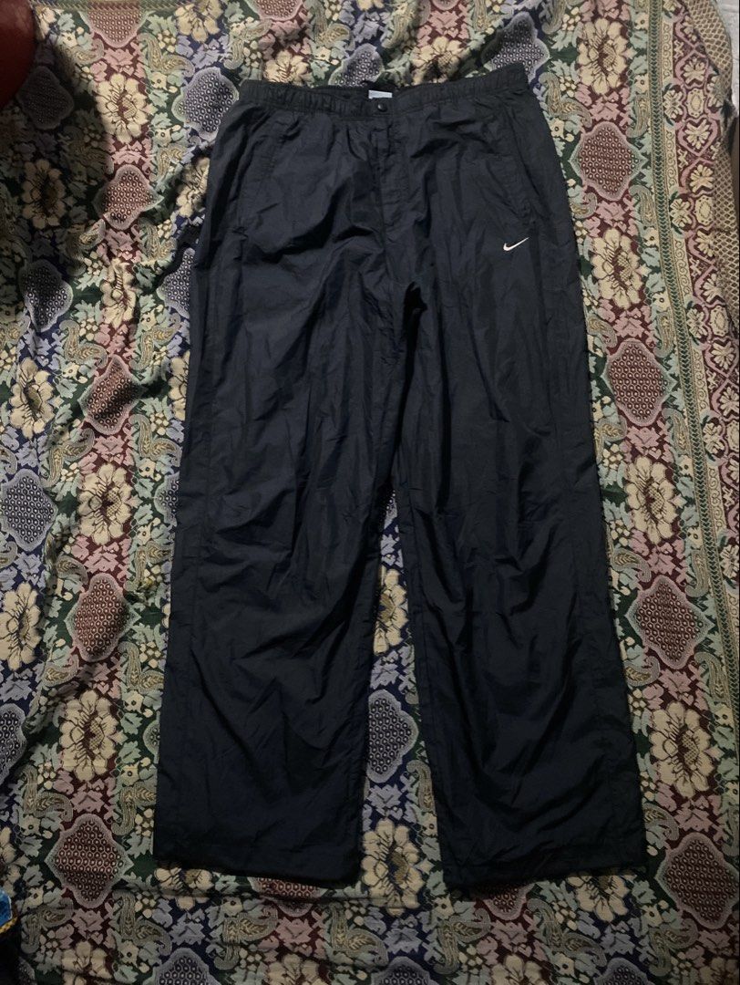 Nike Black Windbreaker Pants Drawstring Cuffs XL (Category: Joggers) located in Manila. Submitted by zhu.finds (Listing ID 1470249122, Image 1). Description: - Brand: Nike - Item: Track Pants - Color: Black - Size: XL - Waistband: Elastic with snap button closure - Cuffs: Adjustable drawstring at the ankles - Interior: Breathable mesh lining - Origin: Made in Vietnam - Condition: Excellent / Ready to wear.