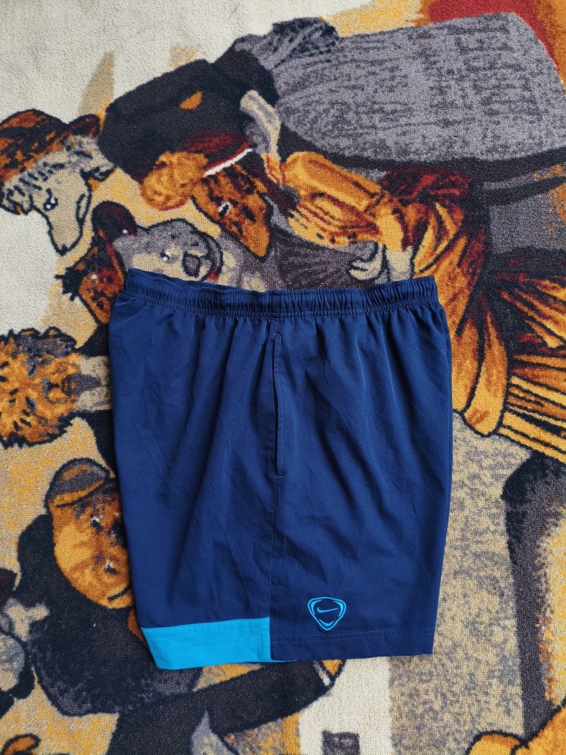 Nike Blue Athletic Shorts Size L (Category: Shorts) located in Davao. Submitted by simonandre53791 (Listing ID 1470253239, Image 2). Description: - Brand: Nike - Color: Bright blue with logo detail near the hem - Size: Large - Material: Lightweight fabric - Fit: Elastic waistband for a comfortable fit - Ideal for: Workouts or casual lounging - Origin: Made in Indonesia - Condition: Clean, ready to wear.
