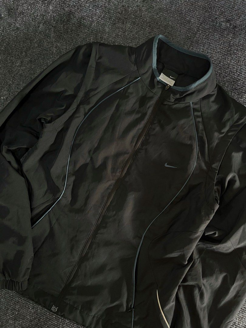 Nike convertible zip-off sleeves track jacket black (Category: Coats, Jackets and Outerwear) located in Los Banos. Submitted by reworn.clo2026 (Listing ID 1470149860, Image 3). Description: Best fit: Small * Width: 16.5 * Length: 22.5.