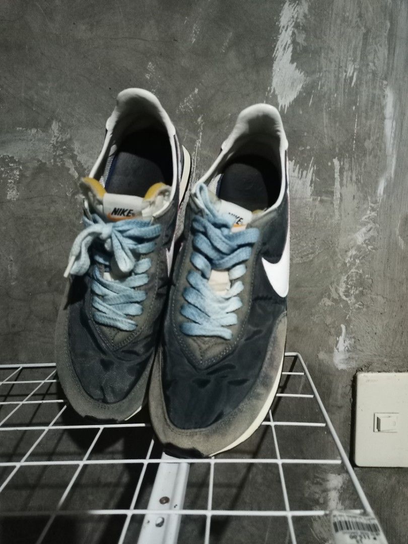Nike Daybreak DB3004-400 Blue Grey US 12 (Category: Sneakers) located in Mabalacat. Submitted by hasashoe (Listing ID 1470281643, Image 2). Description: - Brand/Model: Nike Daybreak - Colorway: Blue and Grey with White Swoosh and light blue laces - Style Code: DB3004-400 - Size: US 12 / UK 11 / EUR 46 / CM 30 - Condition: Classic vintage runner style, clean interior tags, and good tread remaining on the waffle sole.