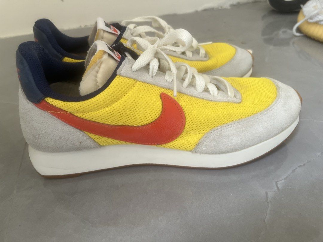 Nike Daybreak Yellow Red Navy Sneakers (Category: Sneakers) located in Bulacan. Submitted by jhemieee (Listing ID 1470192159, Image 3). Description: - Bright yellow mesh upper with stylish grey suede overlays - Eye-catching red swoosh and navy blue heel tab for contrast - Comfortable foam midsole and classic waffle-pattern gum rubber outsole - Vintage runner aesthetic that stands out - Fitted with neat, clean white laces - DM for size, availabili