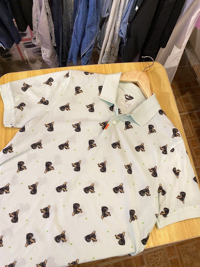 Nike Dri-FIT Slim Fit Doberman (Category: Tshirts & Polo Shirts ) located in Manila. Submitted by thriftvibes324 (Listing ID 1470244071, Image 1). Description: - Brand: Nike - Style: Slim fit polo with Doberman dog print and green dot pattern - Color: Light blue - Size: M - Material/Tech: Dri-FIT fabric to keep you dry - Details: Standard collar with 2 buttons, orange side tab - Style Code: DQ4577-379 - Condition: Clean and well-kept.
