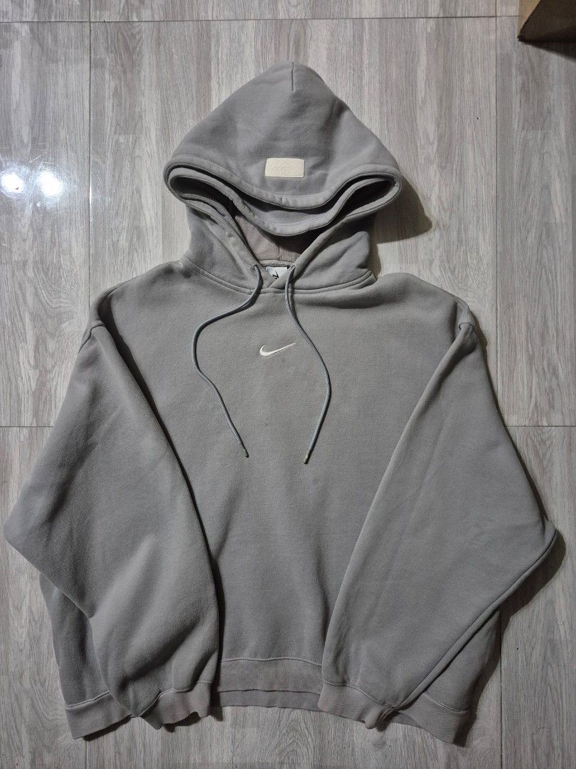Nike FOG (Category: Hoodies) located in Taguig. Submitted by kai.exe (Listing ID 1470306272, Image 1). Description: Nike Fear of God double hoodie Size Small on tag 🏷️ Dimes Width 23 Length 26 Brandnew condition Color rate 9.8 or better No issue or stain Original/Authentic PM for more details❗❗❗.