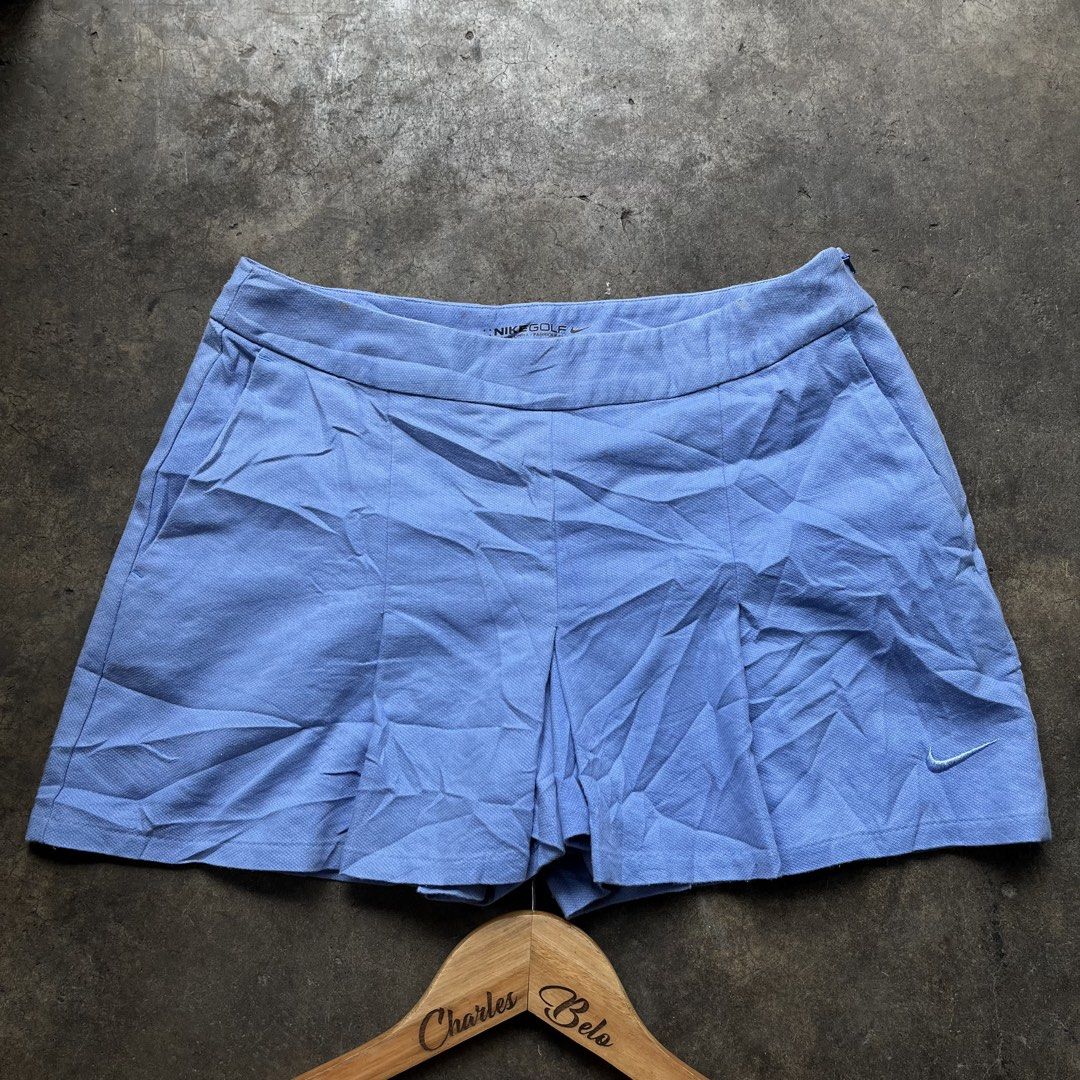 Nike Golf Dri-Fit Blue Pleated Skort (Category: Skirts) located in Davao. Submitted by charlesole52665 (Listing ID 1470184141, Image 1). Description: - Brand: Nike Golf - Color: Light Blue - Size: 0 (Waist: 61-80cm, Hips: 80cm) - Waistline: 26 - Length: 11.5 - Technology: Dri-Fit fabric keeps you cool and dry - Design: Pleated front with built-in shorts underneath for comfort and coverage - Details: Side zipper closure and embroidered Nike swoosh
