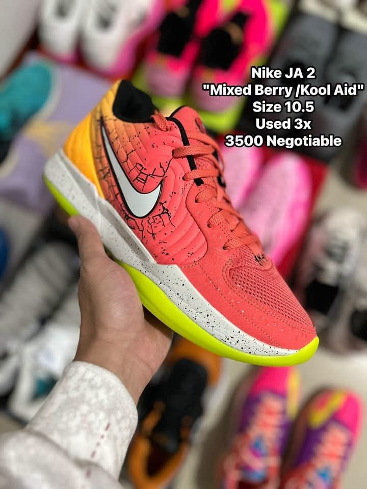 Nike JA 2 Mixed Berry Kool Aid (Category: Sneakers) located in Quezon City. Submitted by bertsonamilasolidshoes (Listing ID 1470174991, Image 1). Description: - Brand: Nike - Model: JA 2 (Mixed Berry / Kool Aid colorway) - Size: US 10.5 - Condition: Worn only 3 times, uppers and soles are super clean - Design: Bright orange and red upper with cracked pattern, white speckled midsole, and neon yellow outsole - Perfect for: Basketball performance an