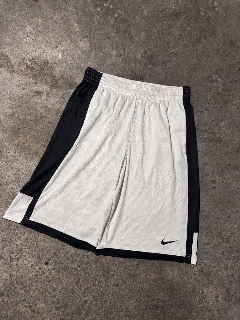 Nike jersey white short (Category: Shorts) located in Pasig City. Submitted by dripthrift1600 (Listing ID 1470316105, Image 1). Description: - Nike Jersey White short - Good condition - Issue: stain / needwash - Sizes: L - Dimes: 28x22.