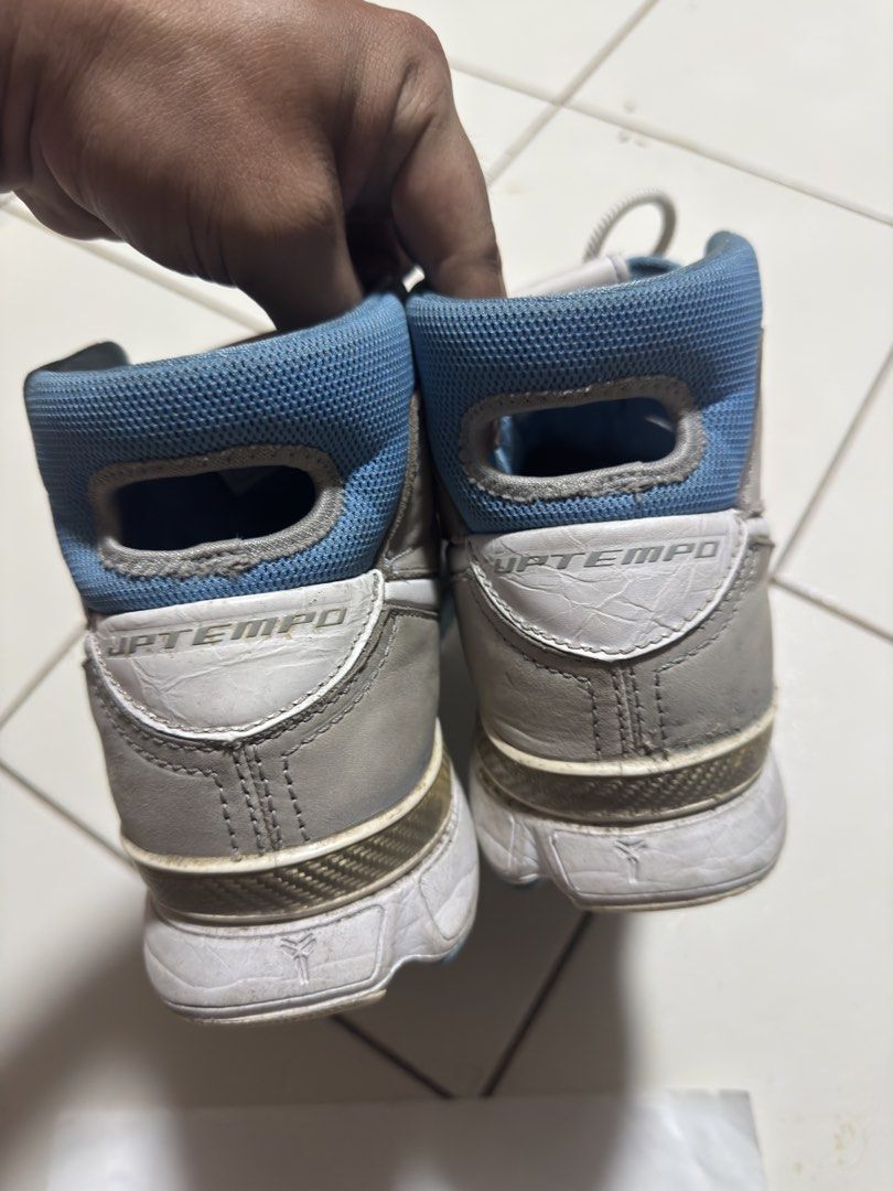 Nike Kobe 1 Protro MPLS Grey Blue Size 9.5 (Category: Sneakers) located in Manila. Submitted by mislangers_stuff (Listing ID 1470208212, Image 3). Description: - Model: Nike Kobe 1 Protro (MPLS colorway) - Size: US 9.5 / UK 8.5 / EUR 43 / 27.5 cm - Color: Grey and light blue with white Swoosh and 'MPLS' branding - Details: Leather upper, Zoom Air cushioning, carbon fiber shank plate, and Kobe sheath logo - Condition: Upper shows creasing and wear
