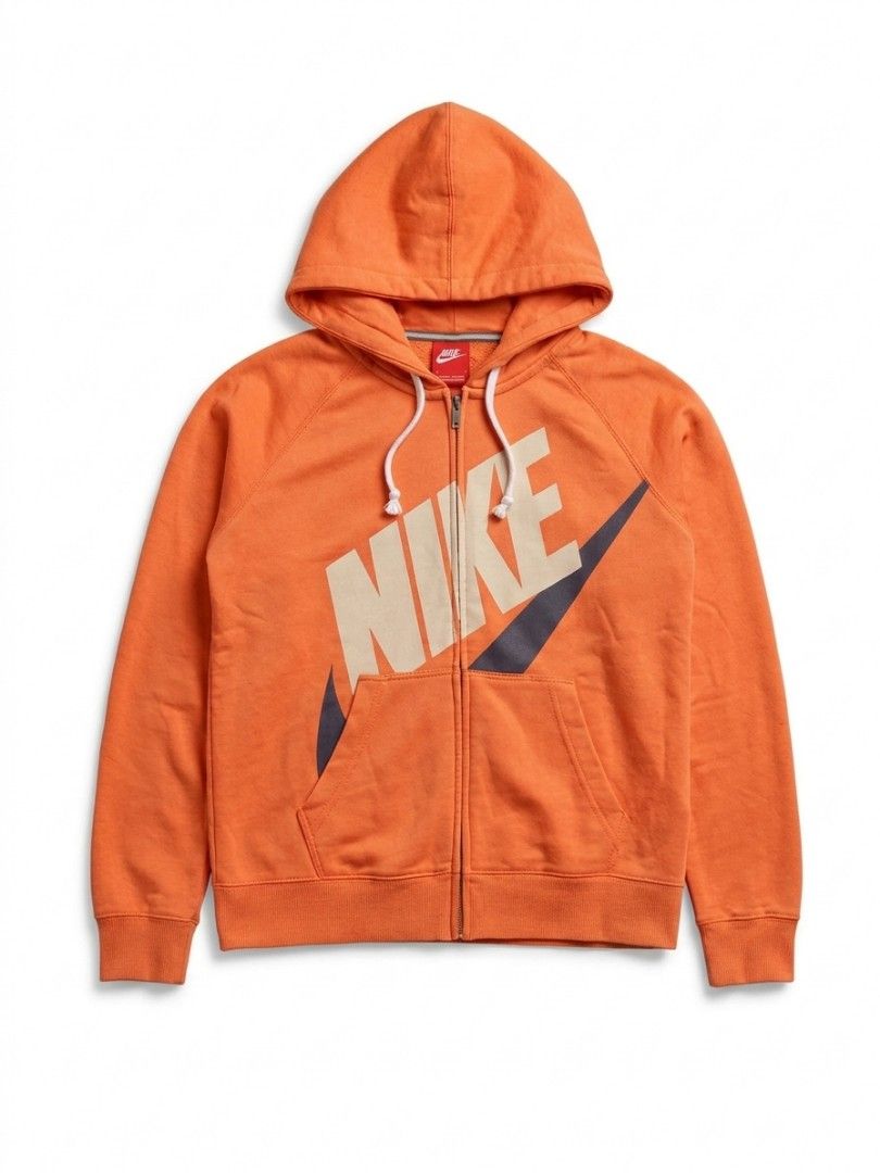 Nike Orange Zip-Up Hoodie (Category: Coats, Jackets and Outerwear) located in Manila. Submitted by raquimsyt (Listing ID 1470224771, Image 1). Description: - Brand: Nike - Style: Zip-up hoodie - Color: Bright orange with cream and navy front logo - Size: Medium (M) - Features: White drawstring hood with frayed tassel ends, front split kangaroo pocket, ribbed cuffs and hem - Condition: Pre-loved, well-maintained.