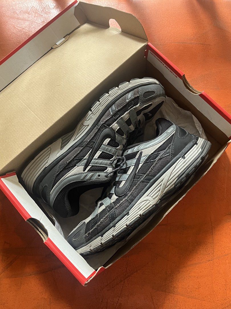Nike P-6000 Black Grey Sneakers with Box (Category: Sneakers) located in Iloilo. Submitted by matthewyap53343 (Listing ID 1470195245, Image 3). Description: - Model: Nike P-6000 running shoes - Colorway: Black and Grey - Style: Chunky retro silhouette featuring mesh and suede overlays - Fit: True to size - Condition: Clean overall with minimal wear on the soles - Inclusion: Comes with original Nike shoebox.