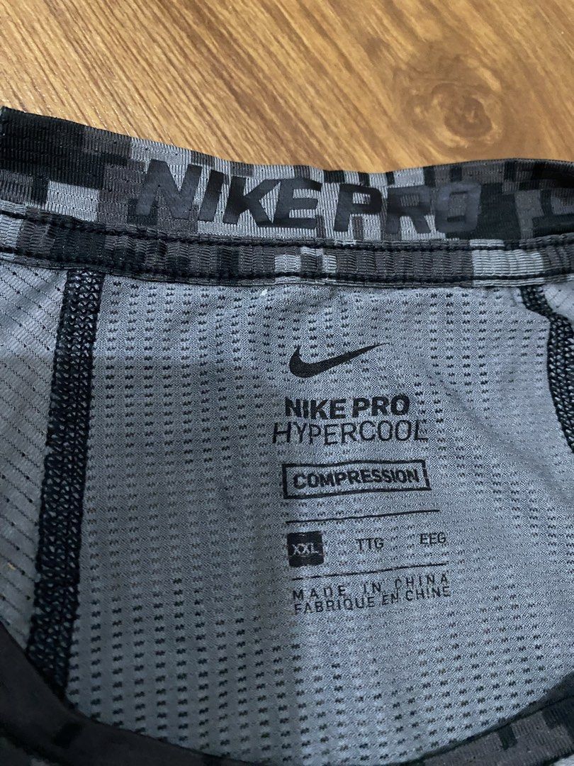 Nike Pro Hypercool Compression Shirt (Category: Activewear) located in Taguig. Submitted by maaarrrrrcky (Listing ID 1470267384, Image 2). Description: - Brand: Nike Pro - Item: Hypercool Compression Shirt - Color: Grey - Size: XXL on tag pero small size siya - Condition: Excellent / Pre-loved - Ventilated mesh fabric for ultimate breathability - Elastic waistband with iconic repeating Nike Pro logo - Made in China.
