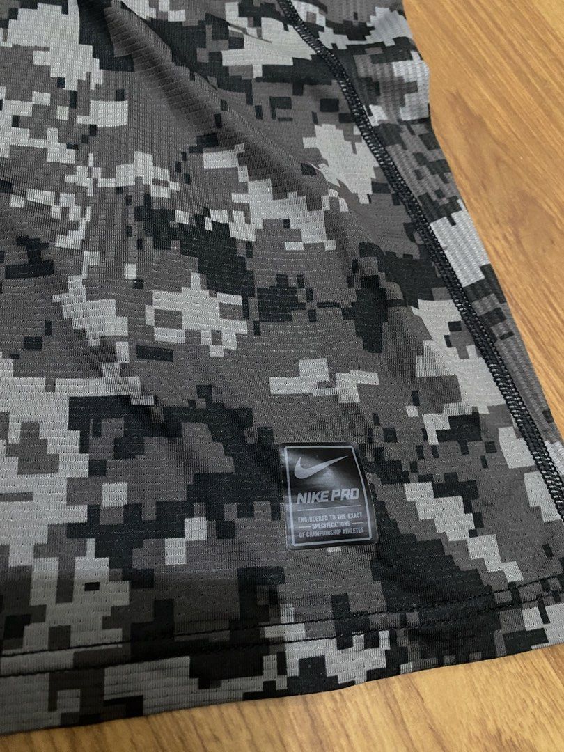 Nike Pro Hypercool Compression Shirt (Category: Activewear) located in Taguig. Submitted by maaarrrrrcky (Listing ID 1470267384, Image 3). Description: - Brand: Nike Pro - Item: Hypercool Compression Shirt - Color: Grey - Size: XXL on tag pero small size siya - Condition: Excellent / Pre-loved - Ventilated mesh fabric for ultimate breathability - Elastic waistband with iconic repeating Nike Pro logo - Made in China.