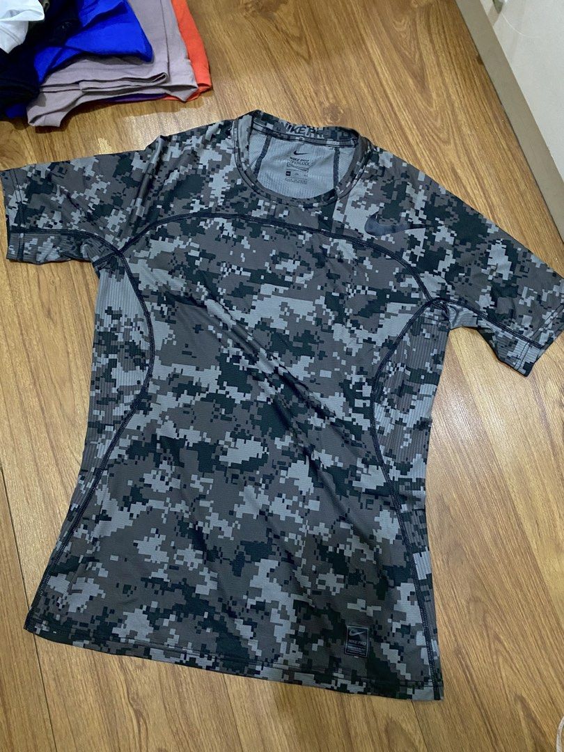 Nike Pro Hypercool Compression Shirt (Category: Activewear) located in Taguig. Submitted by maaarrrrrcky (Listing ID 1470267384, Image 1). Description: - Brand: Nike Pro - Item: Hypercool Compression Shirt - Color: Grey - Size: XXL on tag pero small size siya - Condition: Excellent / Pre-loved - Ventilated mesh fabric for ultimate breathability - Elastic waistband with iconic repeating Nike Pro logo - Made in China.