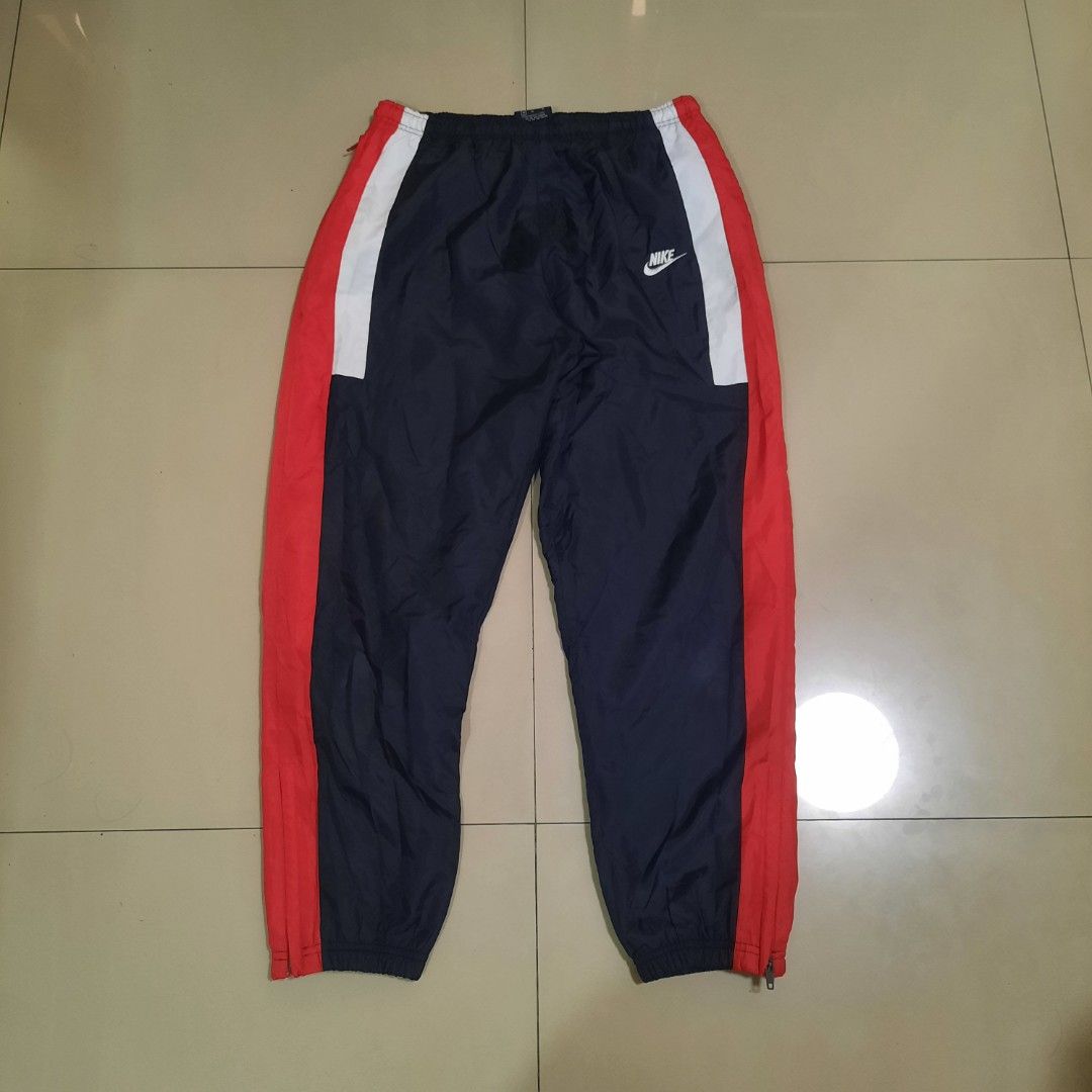 Nike Re-Issue Woven Pants (Category: Joggers) located in Cebu City. Submitted by archivalia.me (Listing ID 1470265968, Image 1). Description: Nike Re-Issue Woven Pants Medium Waist 28-32 Length 37 Good as New No Issue Price dm + sf Loc:Cebu city.