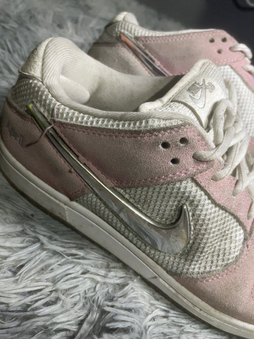 Nike SB Dunk Low Pro April Skateboard (Category: Sneakers) located in Manila. Submitted by kyyyyyih (Listing ID 1470282711, Image 1). Description: - Model: Nike SB Dunk Low Pro x April Skateboards (Turbo Green & Metallic Silver) - Design: White tumbled leather base, pink suede overlays, metallic silver swoosh, and custom graphic transparent outsole - Details: White laces and dual tongue branding with 'April' text - Condition: Well loved pair with