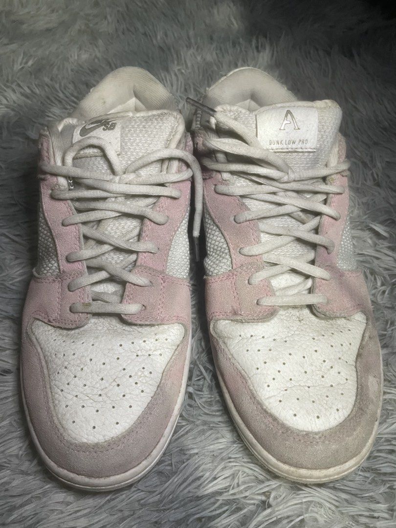 Nike SB Dunk Low Pro April Skateboard (Category: Sneakers) located in Manila. Submitted by kyyyyyih (Listing ID 1470282711, Image 2). Description: - Model: Nike SB Dunk Low Pro x April Skateboards (Turbo Green & Metallic Silver) - Design: White tumbled leather base, pink suede overlays, metallic silver swoosh, and custom graphic transparent outsole - Details: White laces and dual tongue branding with 'April' text - Condition: Well loved pair with