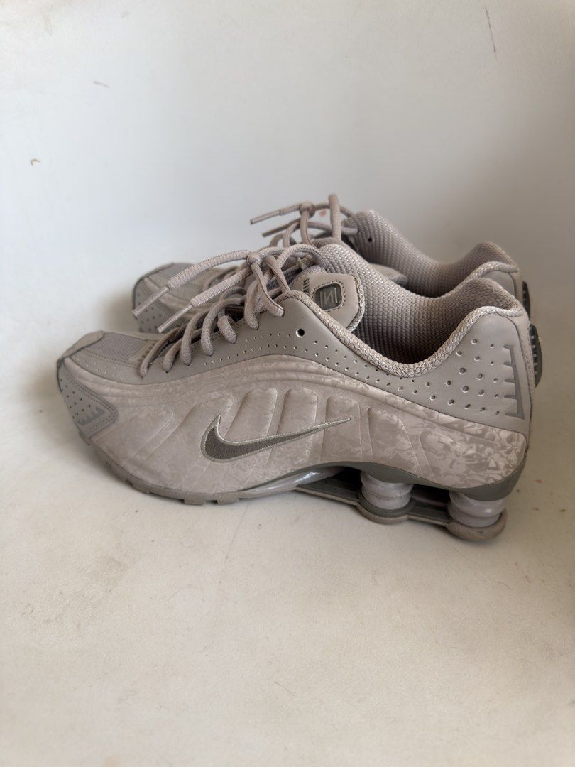 Nike Shox R4 (Category: Sneakers) located in Quezon City. Submitted by socutexx (Listing ID 1470205750, Image 3). Description: Nike Shox R4 “College Grey/Flat Pewter” - Style: Classic early 2000s runner silhouette with textured upper pattern - Comfort: Iconic pillared cushioning setup under the heel - Condition: worn 2x only RFS: not being used :(.