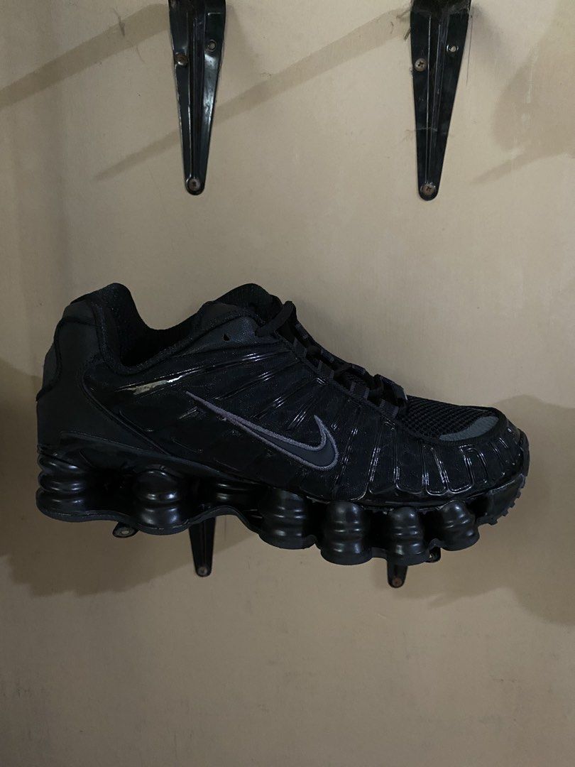 Nike Shox TL Black Metallic Silver (Category: Sneakers) located in Manila. Submitted by rovinxrx (Listing ID 1470295283, Image 1). Description: - Model: Nike Shox TL Triple Black - Cushioning: Iconic full-length mechanical pillars along the midsole - Design: Textured molded cage upper with dark grey swoosh branding - Comfort: Padded mesh tongue and collar - Traction: Grippy rubber outsole tread with plenty of grip left - Condition: Solid everyday