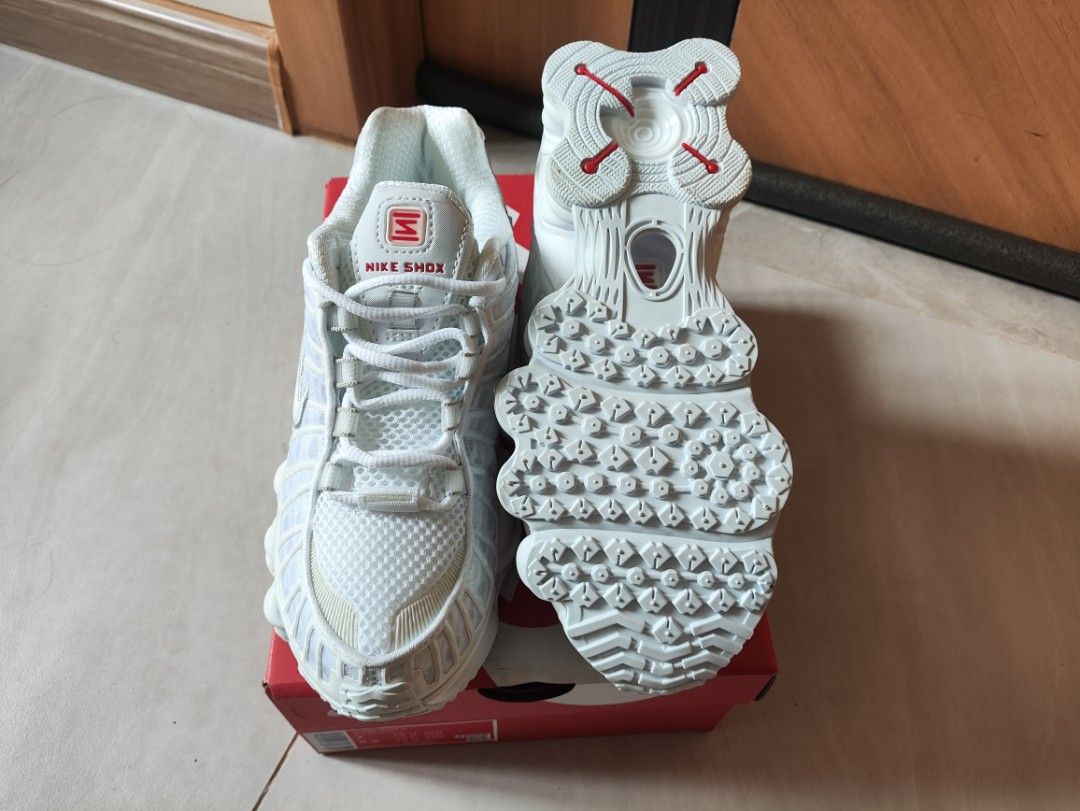 Nike Shox TL White Red Silver Size US 7 (Category: Sneakers) located in Quezon City. Submitted by solid_kicks (Listing ID 1470346162, Image 2). Description: - Model: Nike Shox TL - Colorway: White / Red / Silver - Size: Women's US 7 / UK 4.5 / EUR 38 / CM 24 - Condition: Brand new, unworn, spotless inside and out - Features: Iconic full-length mechanical cushioning pillars and breathable mesh upper with supportive cages - Inclusions: Original box