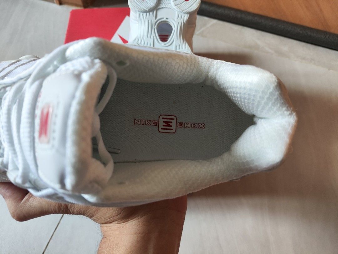 Nike Shox TL White Red Silver Size US 7 (Category: Sneakers) located in Quezon City. Submitted by solid_kicks (Listing ID 1470346162, Image 3). Description: - Model: Nike Shox TL - Colorway: White / Red / Silver - Size: Women's US 7 / UK 4.5 / EUR 38 / CM 24 - Condition: Brand new, unworn, spotless inside and out - Features: Iconic full-length mechanical cushioning pillars and breathable mesh upper with supportive cages - Inclusions: Original box