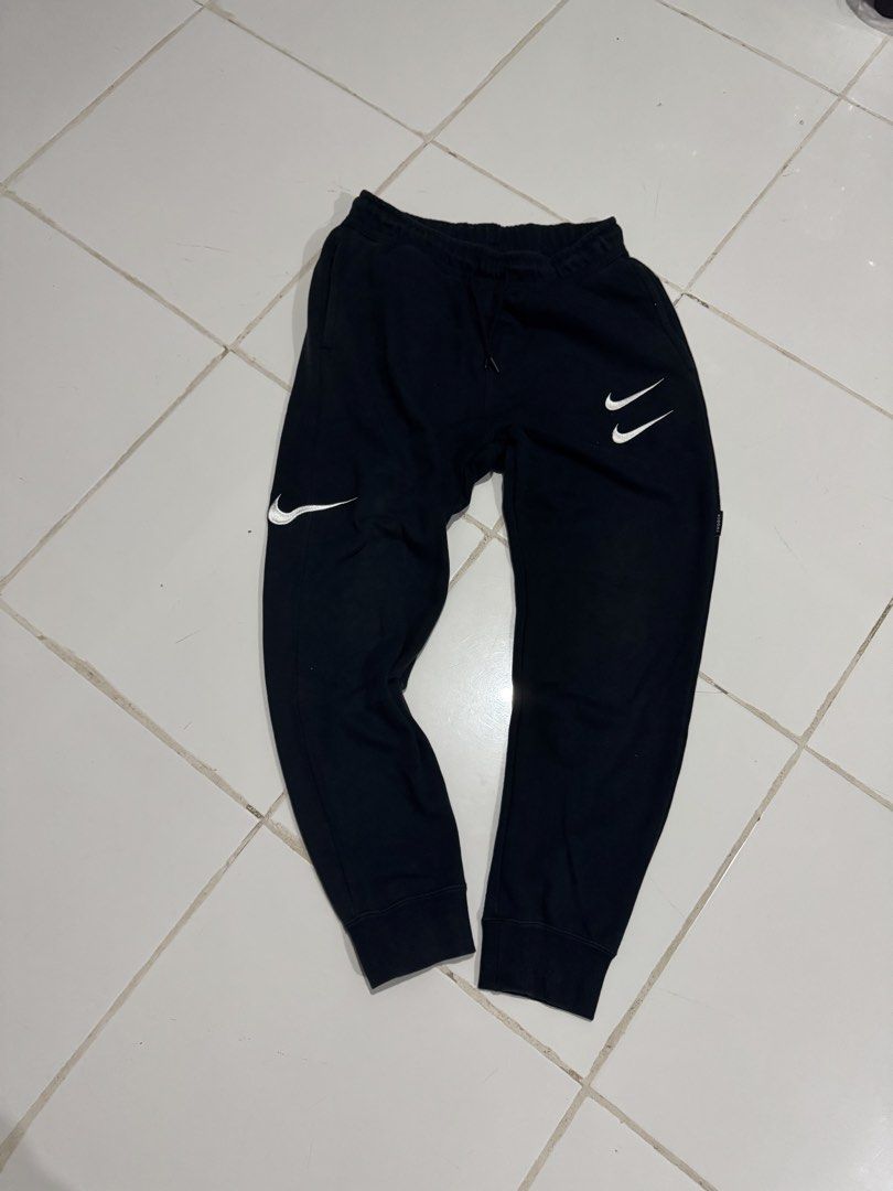 NIKE SPORTSWEAR SWOOSH (Category: Joggers) located in Manila. Submitted by ced.eyy (Listing ID 1470333485, Image 1). Description: NIKE SPORTSWEAR SWOOSH Size: Medium Condition: 9/10 Location: Calamba, Laguna DM to purchase! 📩 Tia..