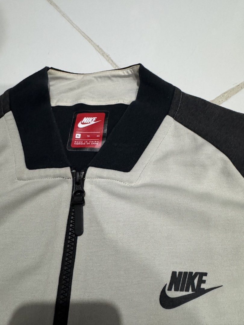 Nike Tech Fleece Varsity/Bomber Jacket (Bone/Cream Color) (Category: Coats, Jackets and Outerwear) located in Manila. Submitted by ced.eyy (Listing ID 1470263956, Image 3). Description: Nike Tech Fleece Varsity/Bomber Jacket (Bone/Cream Color) Size: XL Measurements: W 24” x L 26” Condition: Excellent Location: Calamba, Laguna DM to purchase. 📩 Tia..