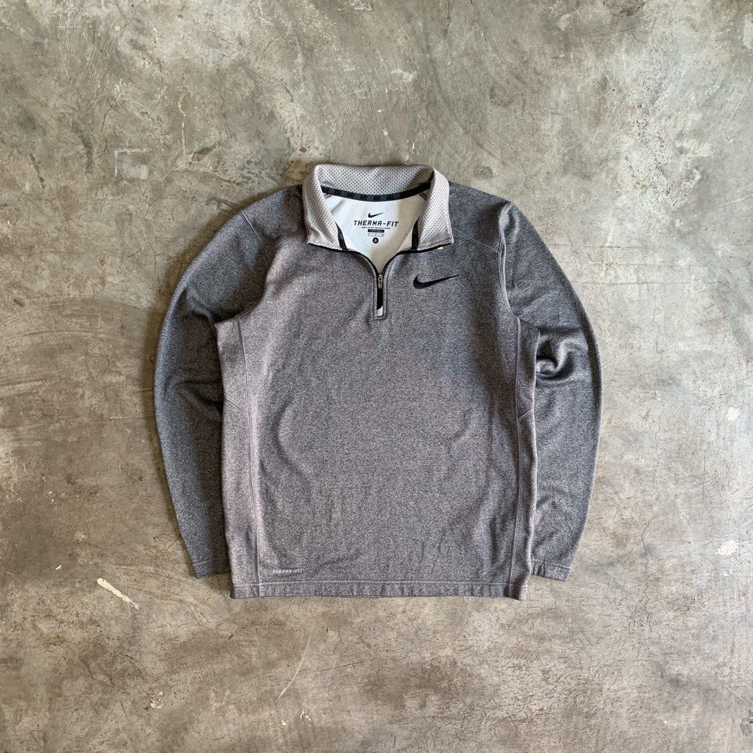 Nike Therma-Fit Grey Half-Zip Pullover Size S (Category: Coats, Jackets and Outerwear) located in Manila. Submitted by emplysthrift. (Listing ID 1470279813, Image 1). Description: Nike Therma Fit Quarter Long Sleeve Size: Medium Width "21.5 Length "27 Excellent Condition Colorrate: 9.5/10 Flaws: none Unli vouchers/vc for safe transactions 📲 Location: Laspinas City, Metro Manila, Brngy Talon Uno. 📍 DM IF INTERESTED📥 - Brand: Nike - Style: Therm