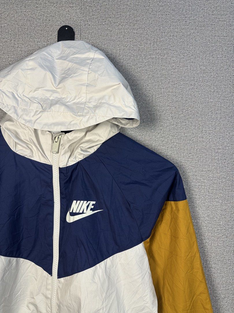 NIKE TRI-TONE WINDBREAKER (Category: Coats, Jackets and Outerwear) located in Rizal. Submitted by jamesthrift (Listing ID 1470164223, Image 2). Description: NIKE TRI-TONE WINDBREAKER Size : L on tag fit to M Dimes: -width 19 -length 23.5 Condition: excellent Color Rate: 9.5 Issue: pen stain 🏷️299+sf.