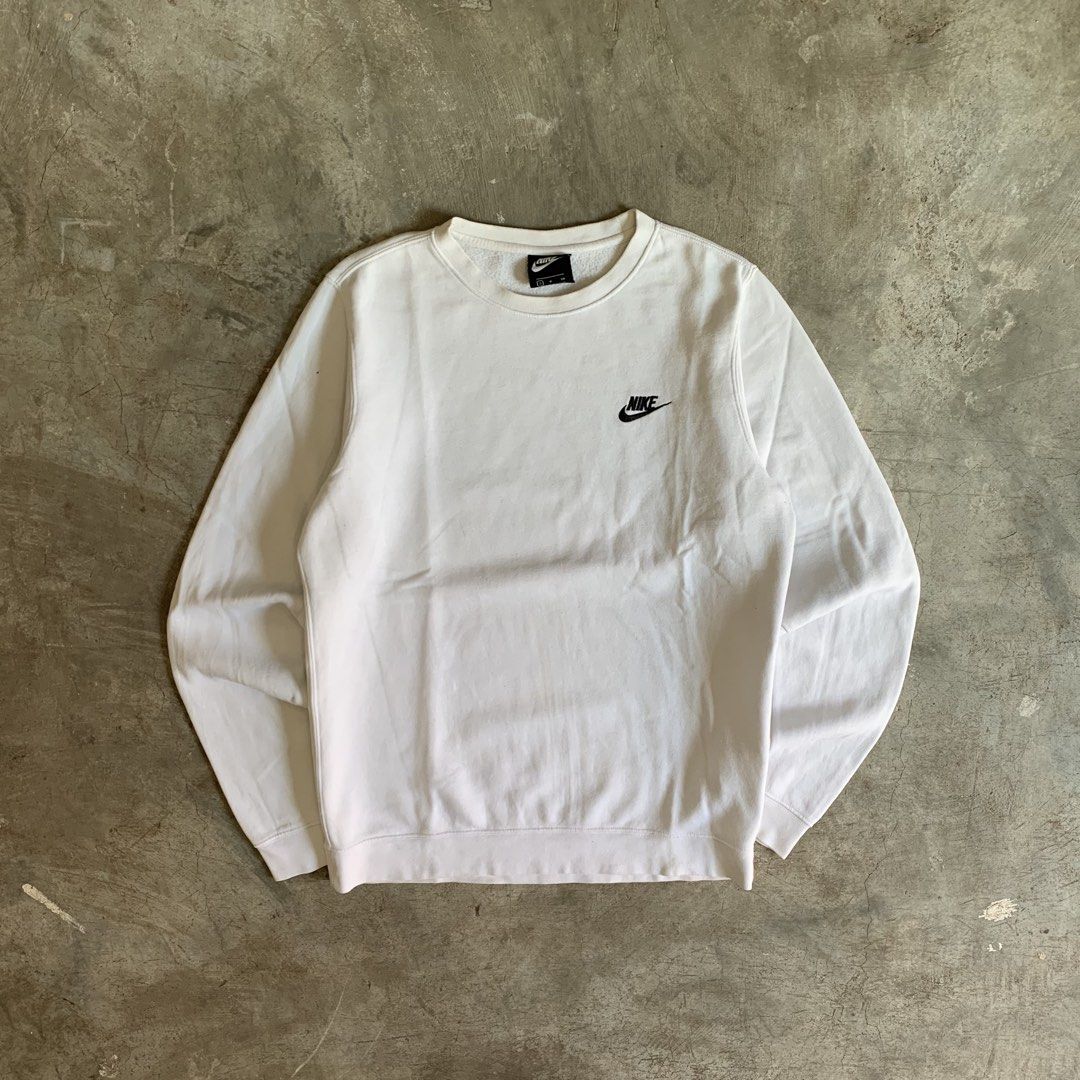 Nike White Sweatshirt Size S (Category: Coats, Jackets and Outerwear) located in Manila. Submitted by emplysthrift. (Listing ID 1470288069, Image 1). Description: Width "21 Length "26.5 Good Condition Colorrate: 9/10 Flaws: yellow stain needwash Unli vouchers/vc for safe transactions 📲 Location: Laspinas City, Metro Manila, Brngy Talon Uno. 📍 DM IF INTERESTED📥 - Brand: Nike - Color: White - Size: Small (S) - Design: Minimalist crewneck with sm