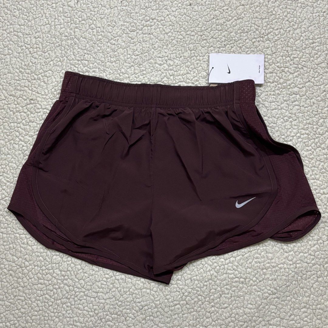 Nike Women's Athletic Shorts (Category: Activewear) located in Bacoor. Submitted by cookiedump (Listing ID 1470233630, Image 2). Description: - Brand: Nike - Colors: Burgundy, orange, and black - Styles: Running shorts with mesh side panels and Nike Pro compression shorts - Features: Elastic waistbands and drawstrings on selected pairs - Condition: Brand new with original store tags attached - Ideal for: Workouts, gym sessions, and casual wear Fo