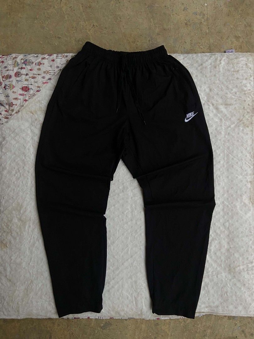 Nike Woven Nylon Pants (Category: Joggers) located in Lianga. Submitted by arwthrifts (Listing ID 1470149549, Image 1). Description: NIKE WOVEN NAYLON PANTS GOOD AS NEW CONDITION NO ISSUE 10/10 COLOR RATE DIMES: 28-33 WAISTLINE 38 LENGTH .