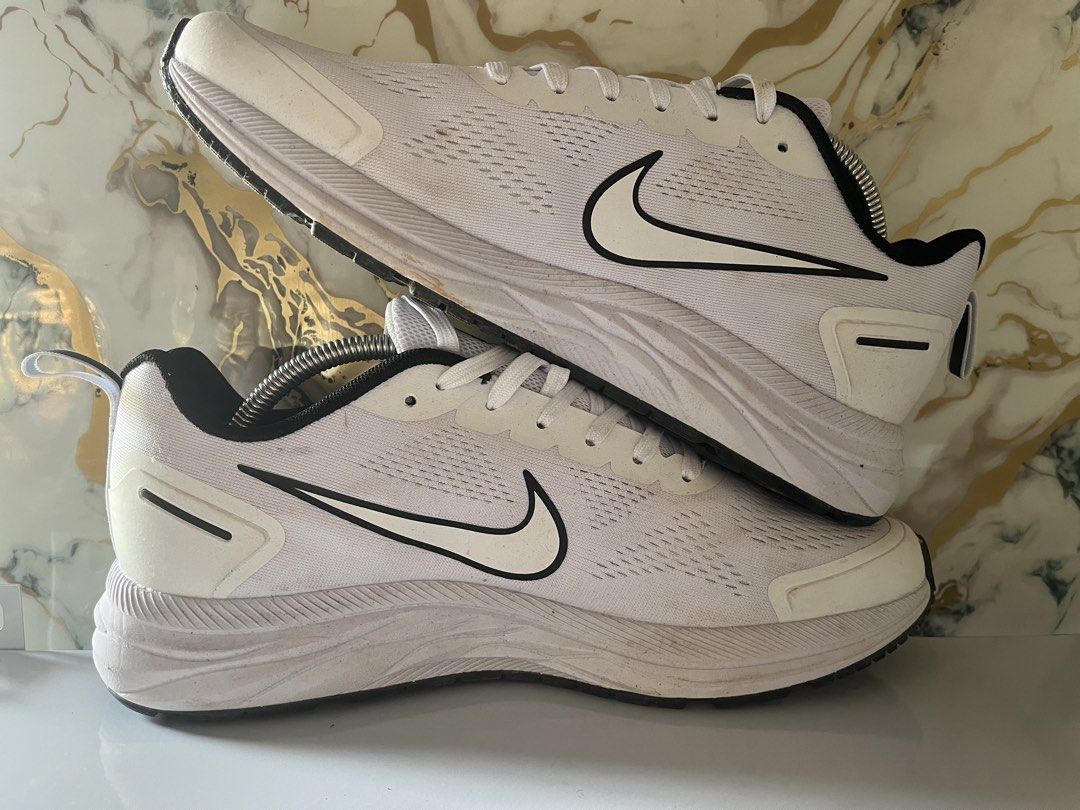 Nike Zoom Winflo 9 White Black US 10 (Category: Sneakers) located in Manila. Submitted by lkiss13 (Listing ID 1470180072, Image 3). Description: - Brand/Model: Nike Zoom Winflo 9 - Colorway: White and Black (Classic & Versatile) - Size: US 10 / Euro 44 - Features: Lightweight mesh upper & cushioned ZoomX technology sole - Condition: Clean uppers with minor dirt on outsoles from light use.