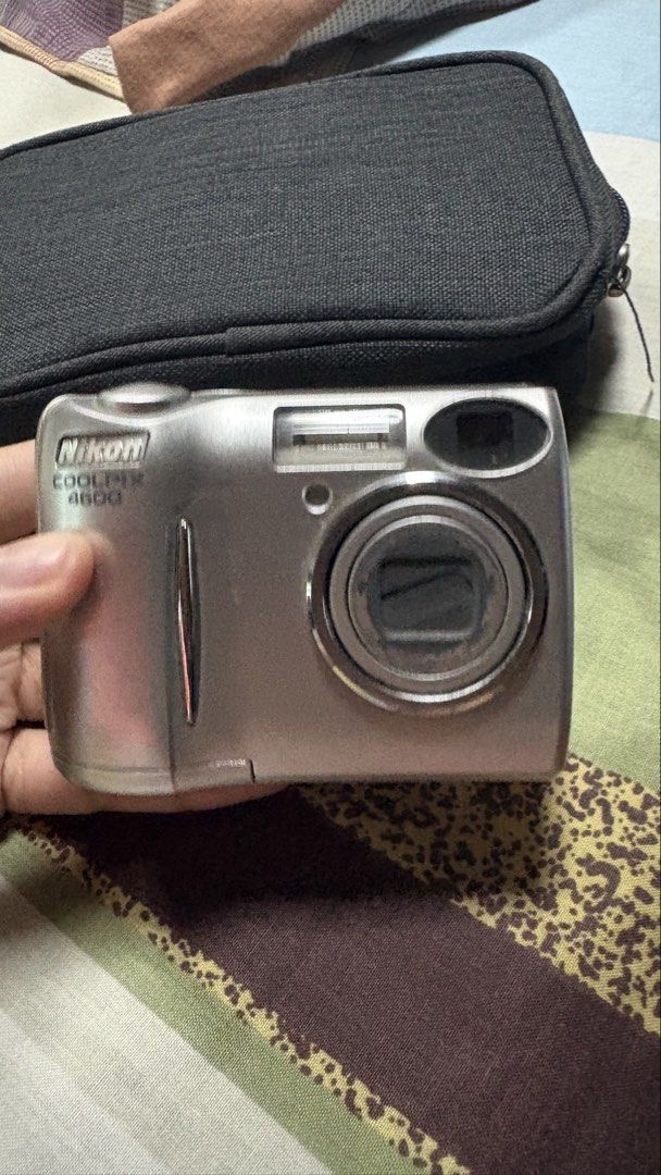 Nikon Coolpix E4600 Digital Camera (Category: Cameras) located in Quezon City. Submitted by _prelovedxogalore (Listing ID 1470199857, Image 1). Description: Unit + Battery + SD Card Reader All working 7/10 body condition (scratches) Flash working.