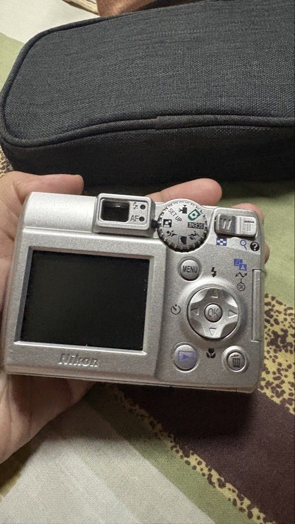 Nikon Coolpix E4600 Digital Camera (Category: Cameras) located in Quezon City. Submitted by _prelovedxogalore (Listing ID 1470199857, Image 3). Description: Unit + Battery + SD Card Reader All working 7/10 body condition (scratches) Flash working.