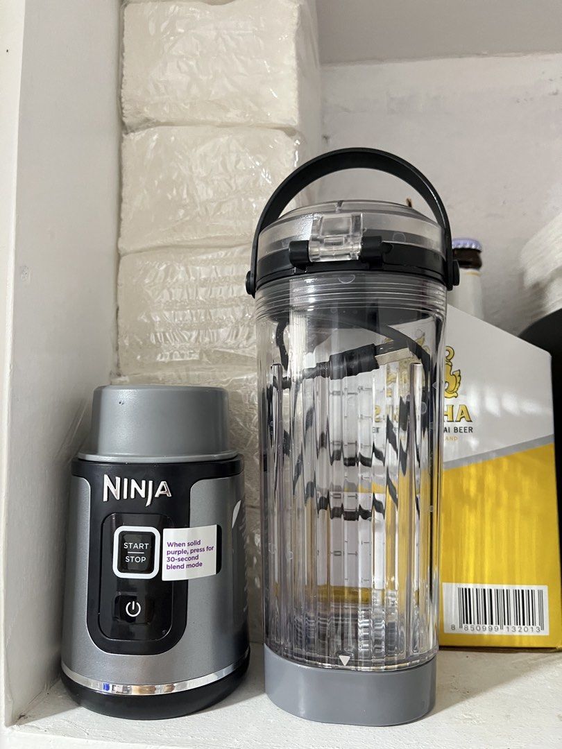 Ninja BC151PHBK Cordless Portable Blender (Category: Juicers, Blenders & Grinders) located in Manila. Submitted by curated.clutter12 (Listing ID 1470150995, Image 2). Description: - Authentic Ninja cordless portable blender in sleek grey and black - Compact motor base with easy start/stop button and 30-second blend mode - Clear 18 oz / 500 ml blending vessel with convenient measurement markings - Includes a handy carrying handle and charging cord