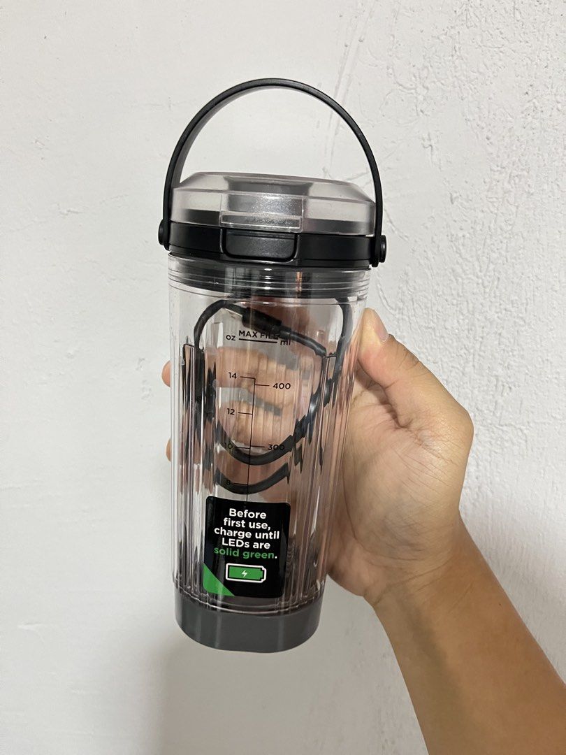 Ninja BC151PHBK Cordless Portable Blender (Category: Juicers, Blenders & Grinders) located in Manila. Submitted by curated.clutter12 (Listing ID 1470150995, Image 1). Description: - Authentic Ninja cordless portable blender in sleek grey and black - Compact motor base with easy start/stop button and 30-second blend mode - Clear 18 oz / 500 ml blending vessel with convenient measurement markings - Includes a handy carrying handle and charging cord