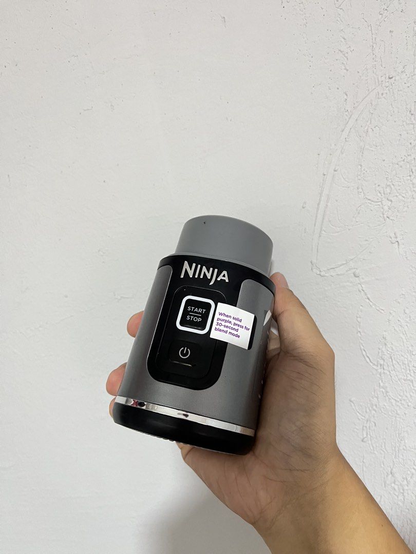 Ninja BC151PHBK Cordless Portable Blender (Category: Juicers, Blenders & Grinders) located in Manila. Submitted by curated.clutter12 (Listing ID 1470150995, Image 3). Description: - Authentic Ninja cordless portable blender in sleek grey and black - Compact motor base with easy start/stop button and 30-second blend mode - Clear 18 oz / 500 ml blending vessel with convenient measurement markings - Includes a handy carrying handle and charging cord