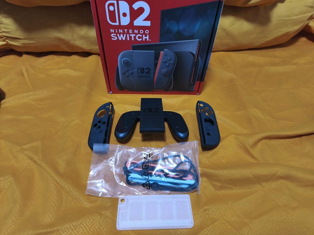 Nintendo Switch 2 Console Bundle with Games and Accessories (Category: Nintendo) located in Quezon City. Submitted by nadinem19 (Listing ID 1470337167, Image 2). Description: 🎮 FOR SALE: NINTENDO SWITCH 2! ₱30,000 (Fixed Price) Almost new, di masyado nagamit. 📦 With accessories as shown in the photos. 💌 DM for inquiries. .