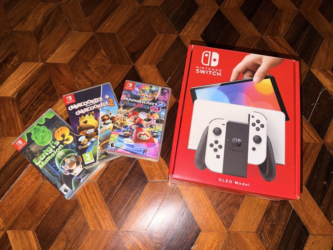 Nintendo Switch OLED + Memory Card (Category: Nintendo) located in Paranaque City. Submitted by labardss (Listing ID 1470203199, Image 1). Description: 🎮 FOR SALE: NINTENDO SWITCH OLED BUNDLE + GAMES 📌 All items were originally purchased from DataBlitz at their original retail prices. Nintendo Switch OLED Bundle – ₱18,000 Includes: • Nintendo Switch OLED Console • SD Card • Carrying Case • 2 pcs. Racing Wheel Controllers • Original box and acce