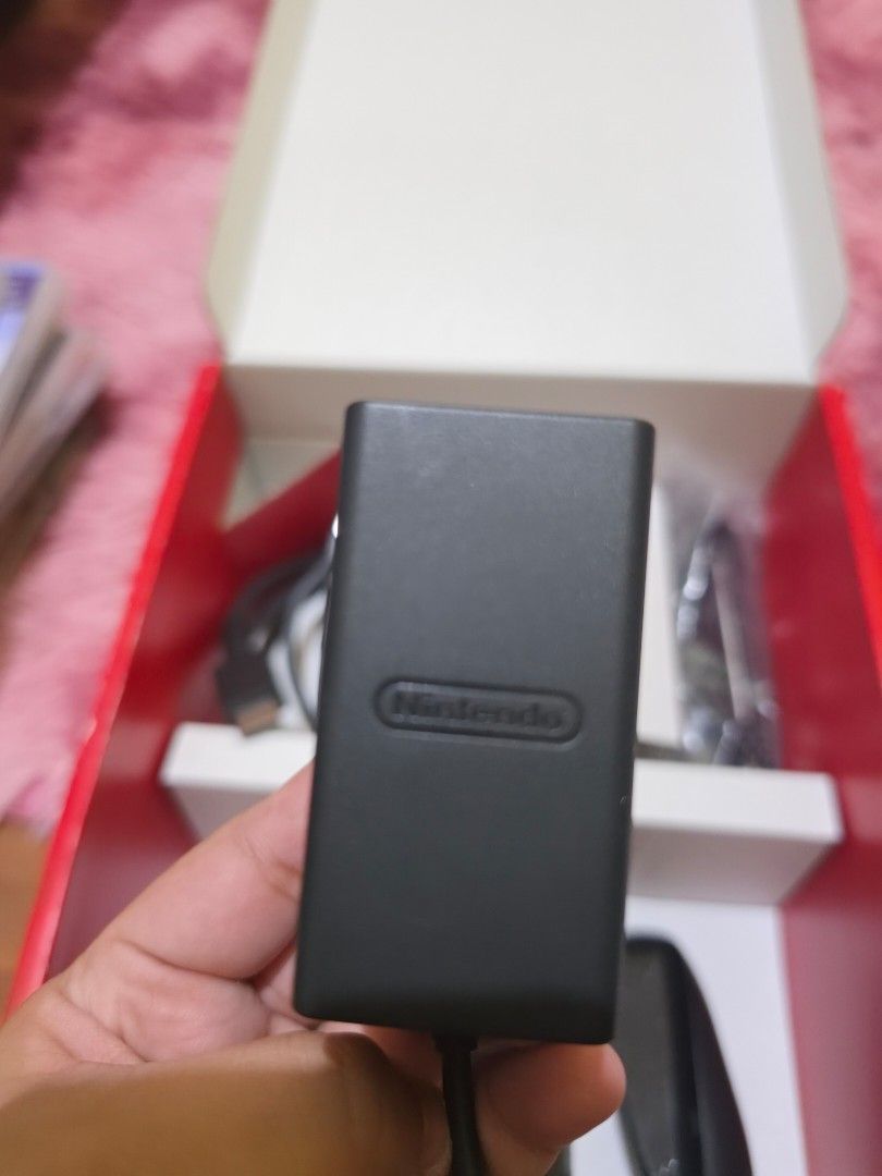 Nintendo switch OLED model (Category: Nintendo) located in Manila. Submitted by cleverwater-6c74 (Listing ID 1470284362, Image 3). Description: FOR SALE: Nintendo Switch OLED Model (White) 🤍 Selling my 3-month-old Nintendo Switch OLED (White) in PRESTINE condition! - Complete accessories included - With screen protector -with warranty pa - Comes with the original receipt from DataBlitz (PM if you're a sure buyer and would like to see the receipt