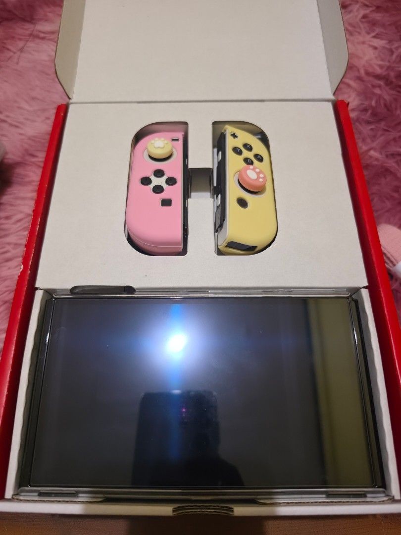Nintendo switch OLED model (Category: Nintendo) located in Manila. Submitted by cleverwater-6c74 (Listing ID 1470284362, Image 2). Description: FOR SALE: Nintendo Switch OLED Model (White) 🤍 Selling my 3-month-old Nintendo Switch OLED (White) in PRESTINE condition! - Complete accessories included - With screen protector -with warranty pa - Comes with the original receipt from DataBlitz (PM if you're a sure buyer and would like to see the receipt