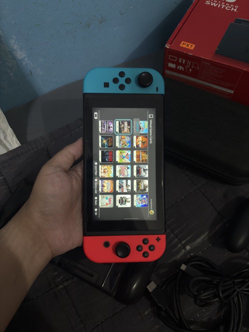 Nintendo Switch V2 with 125 Digital Games (Category: Nintendo) located in Cavite. Submitted by xsavier88 (Listing ID 1470317069, Image 2). Description: 🌟For sale for sale! Nintendo Switch V2 with Games 8,000 PHP 8,000 PHP 8,000 PHP 🌟INCLUSIONS: Complete accessories with box Carrying pouch Protective case 125 Secondary Access Games (Check the attached photos for the list of games) 🌟ADD-ONS: Sandisk 128GB Memory Card - 1,200 Sandisk 256GB Memory