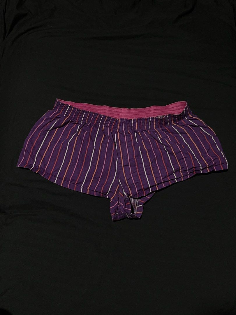No Boundaries Purple Striped Boxer Shorts (Category: Shorts) located in Manila. Submitted by y2kcloset_ (Listing ID 1470182416, Image 1). Description: - Brand: No Boundaries - Design: Purple base with vertical white, pink, and orange stripes - Waistband: Elastic pink with gathered fabric details - Material: Soft and breathable cotton - Fit: Relaxed cut through the legs for maximum comfort - Best for: Lounging around the house or sleeping - Condit