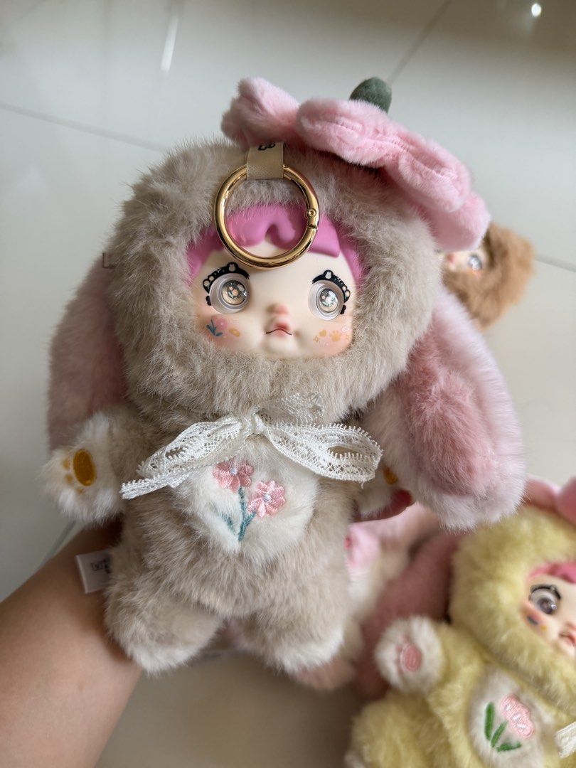 TAKE ALL Nommi Plush Doll Keychain Set (Category: Plushies & Soft Toys) located in Manila. Submitted by carla.declutters (Listing ID 1470183996, Image 3). Description: TAKE ALL FOR ₱1000 issues: no box and foil good condition!! loc: newport, pasay.